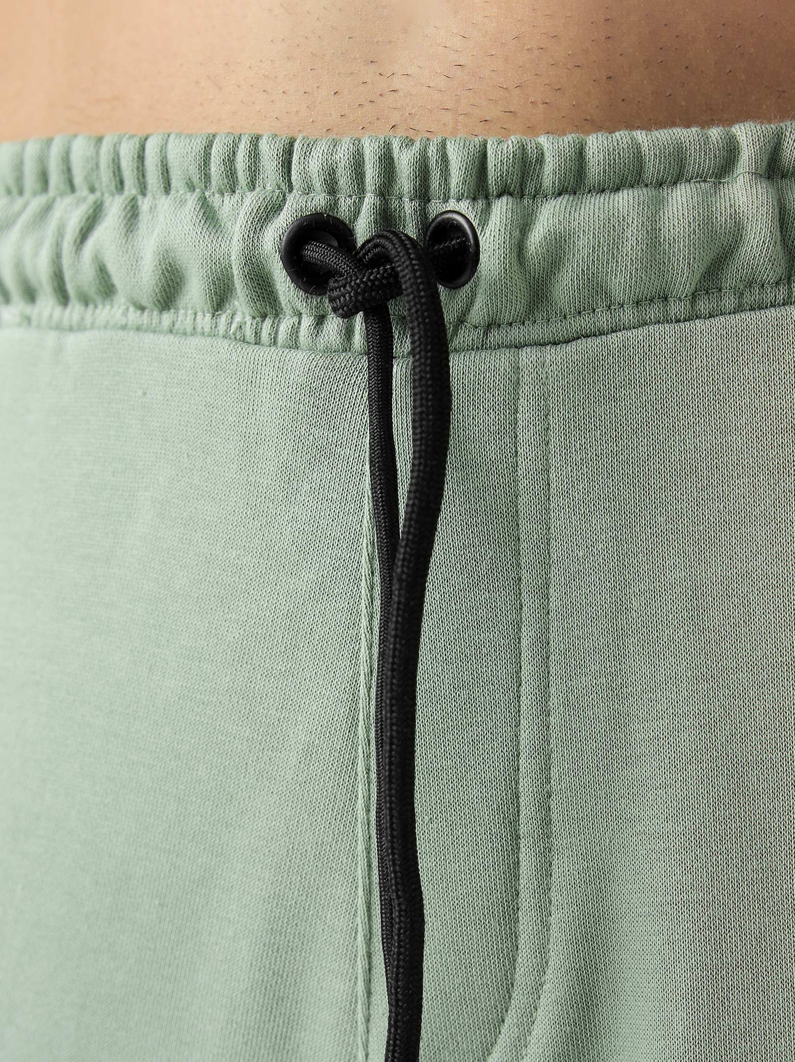 Sage green baggy trousers couple lifestyle shot streetwear Pakistan – GROOVY
