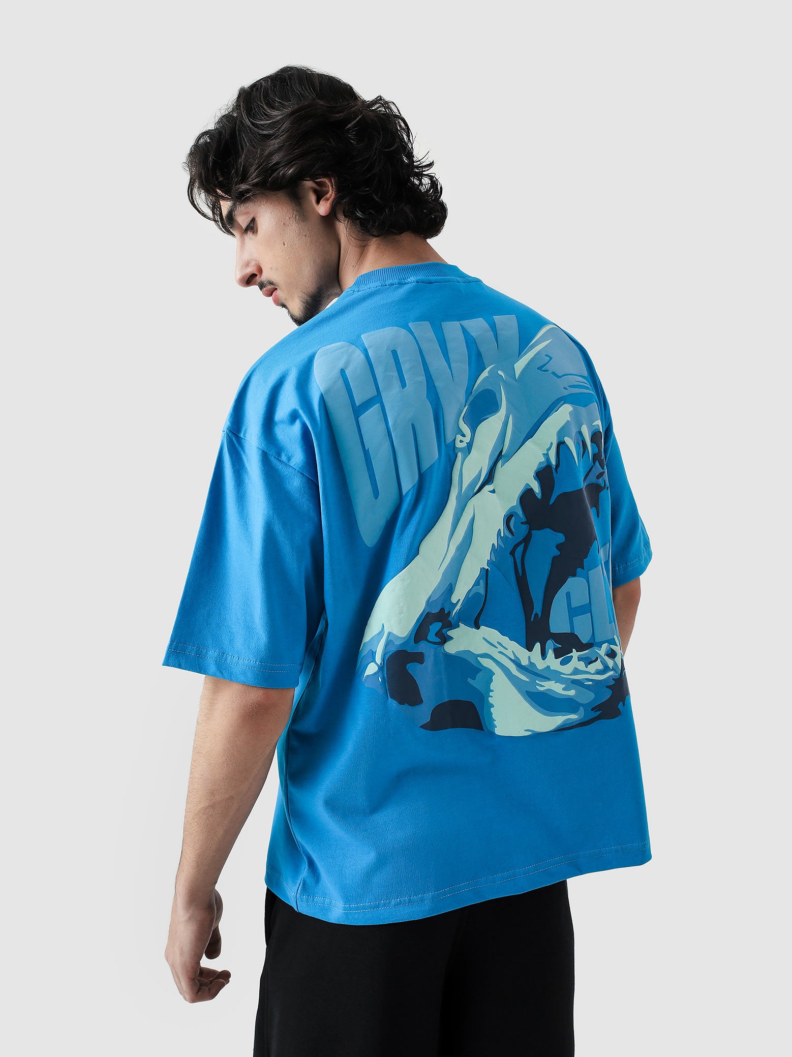 GRVY Shark electric blue oversized tee couple lifestyle shot Pakistan – GROOVY