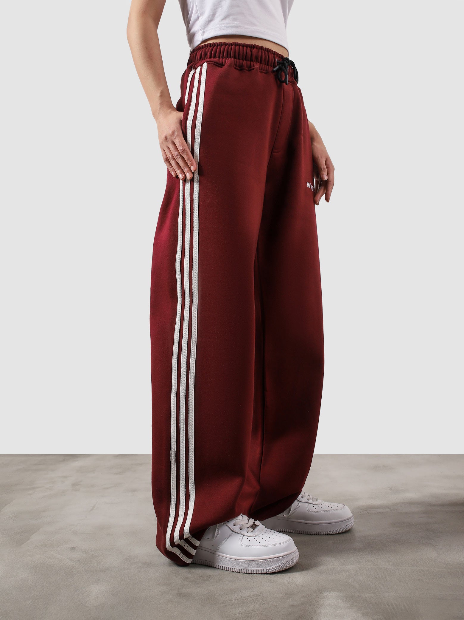 Heritage Pants wine red summer couple lifestyle shot streetwear Pakistan – GROOVY