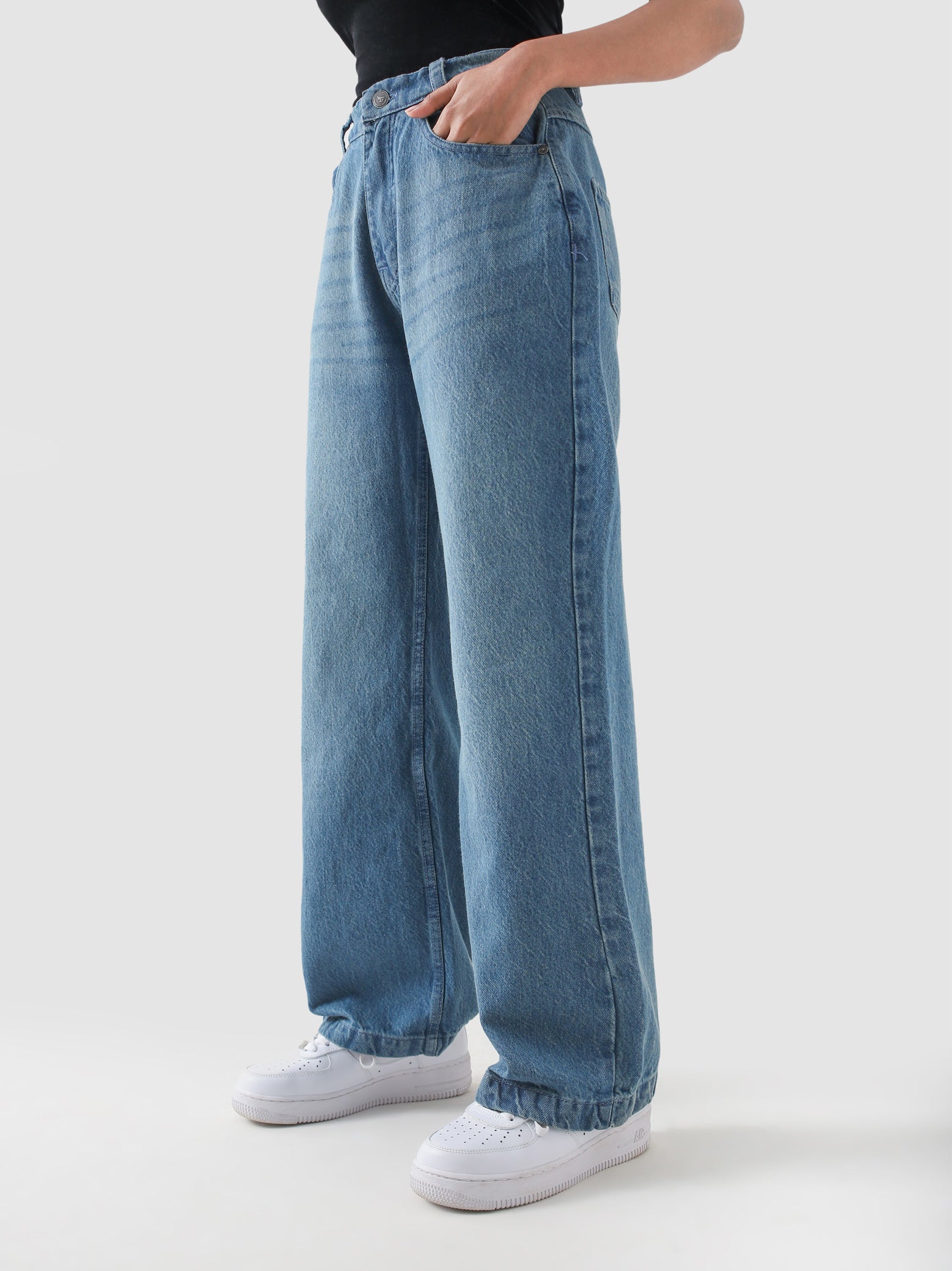 CORE denim washed blue jeans couple lifestyle shot streetwear Pakistan – GROOVY