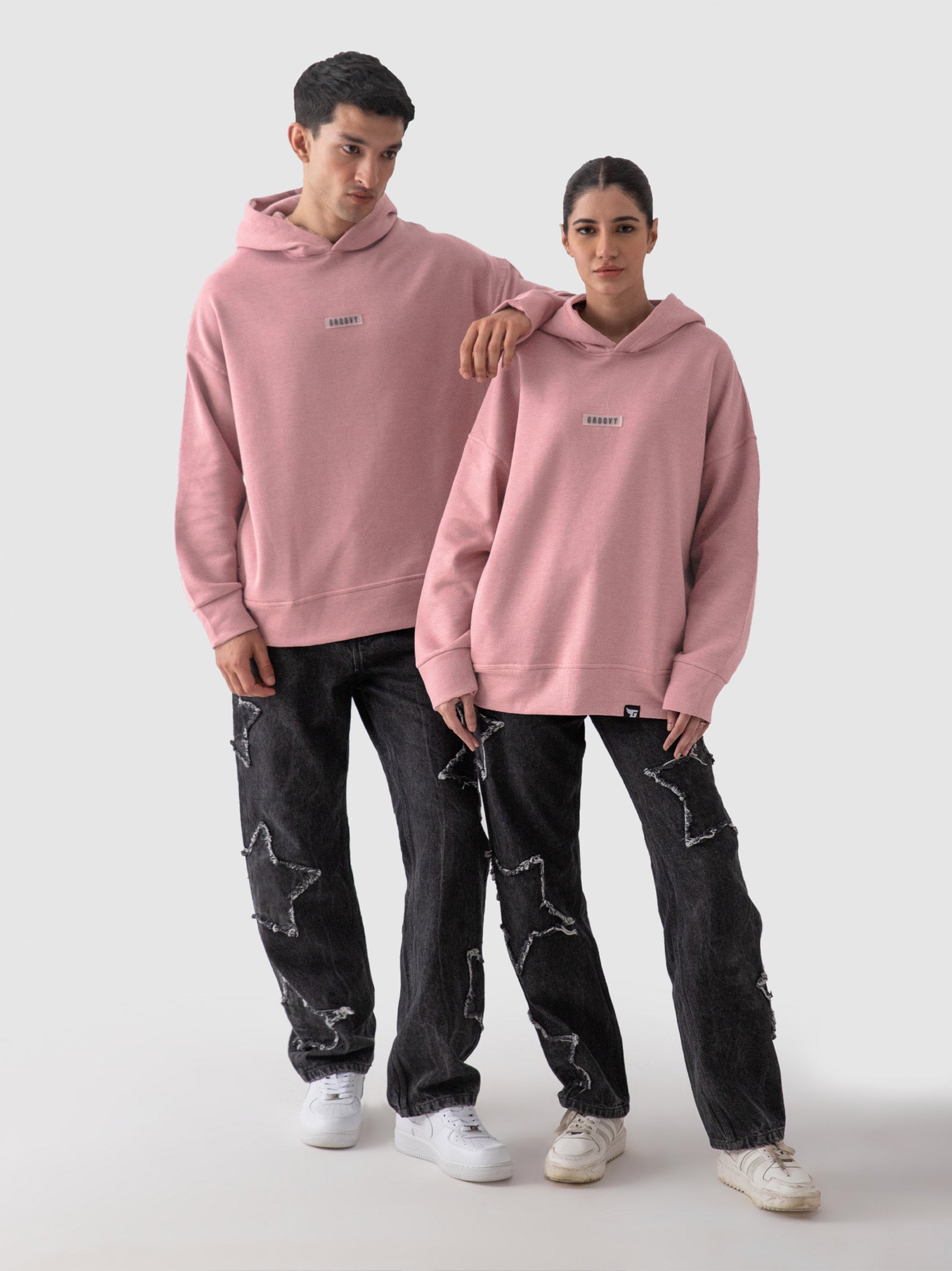 Pastel pink oversized hoodie male model full body front view Pakistan – GROOVY