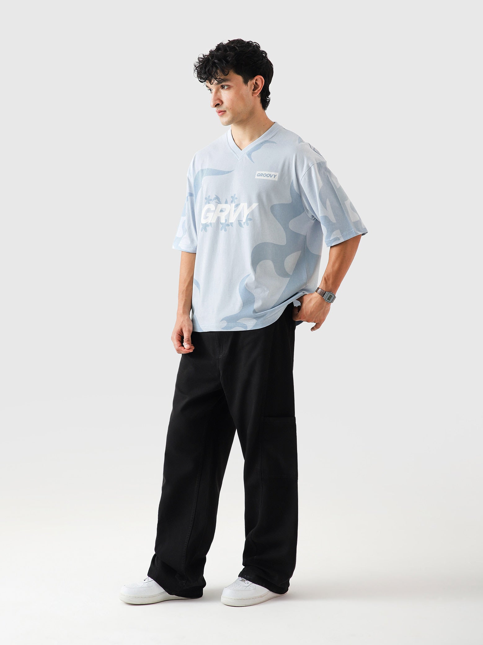 Allover GRVY frost blue tee couple lifestyle shot streetwear Pakistan – GROOVY