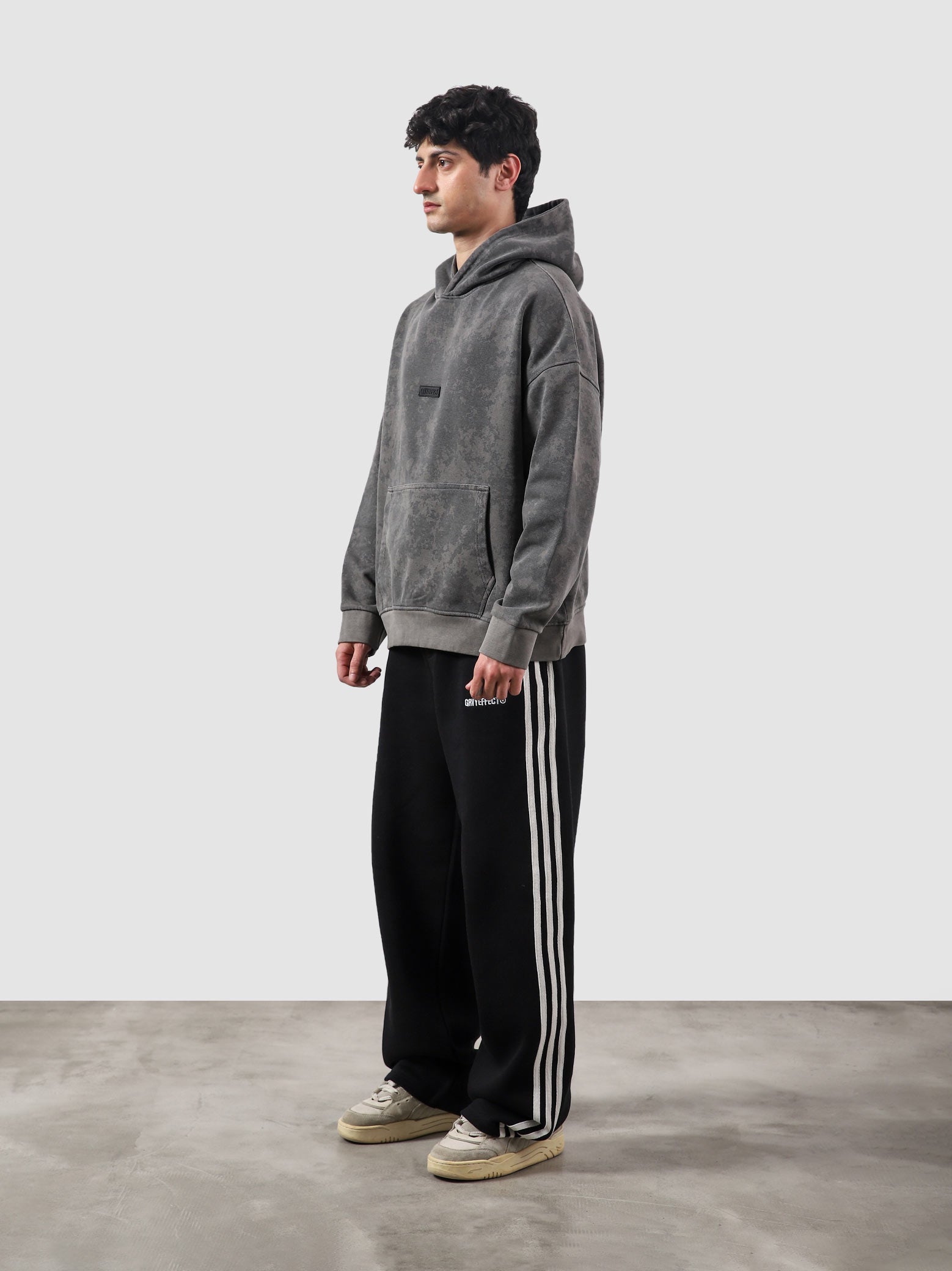 Combat washed hoodie couple lifestyle shot streetwear Pakistan – GROOVY