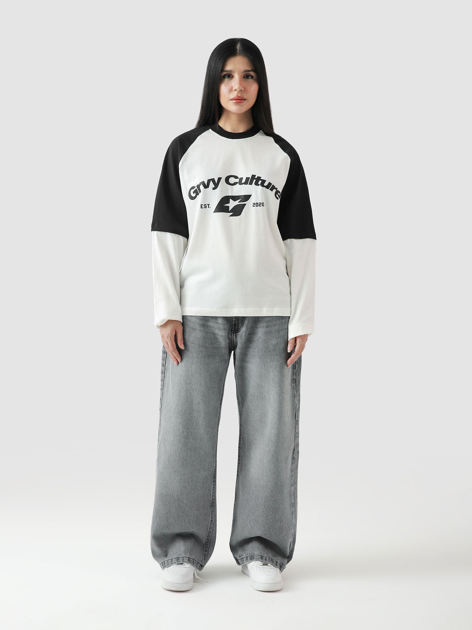 ROLLER TEE female model back view built-in layering streetwear Pakistan – GROOVY