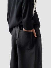 Unity VI black winter trouser couple lifestyle shot streetwear Pakistan – GROOVY