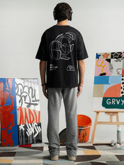 Initial Assembly tee female model back view G logo graphic Pakistan – GROOVY