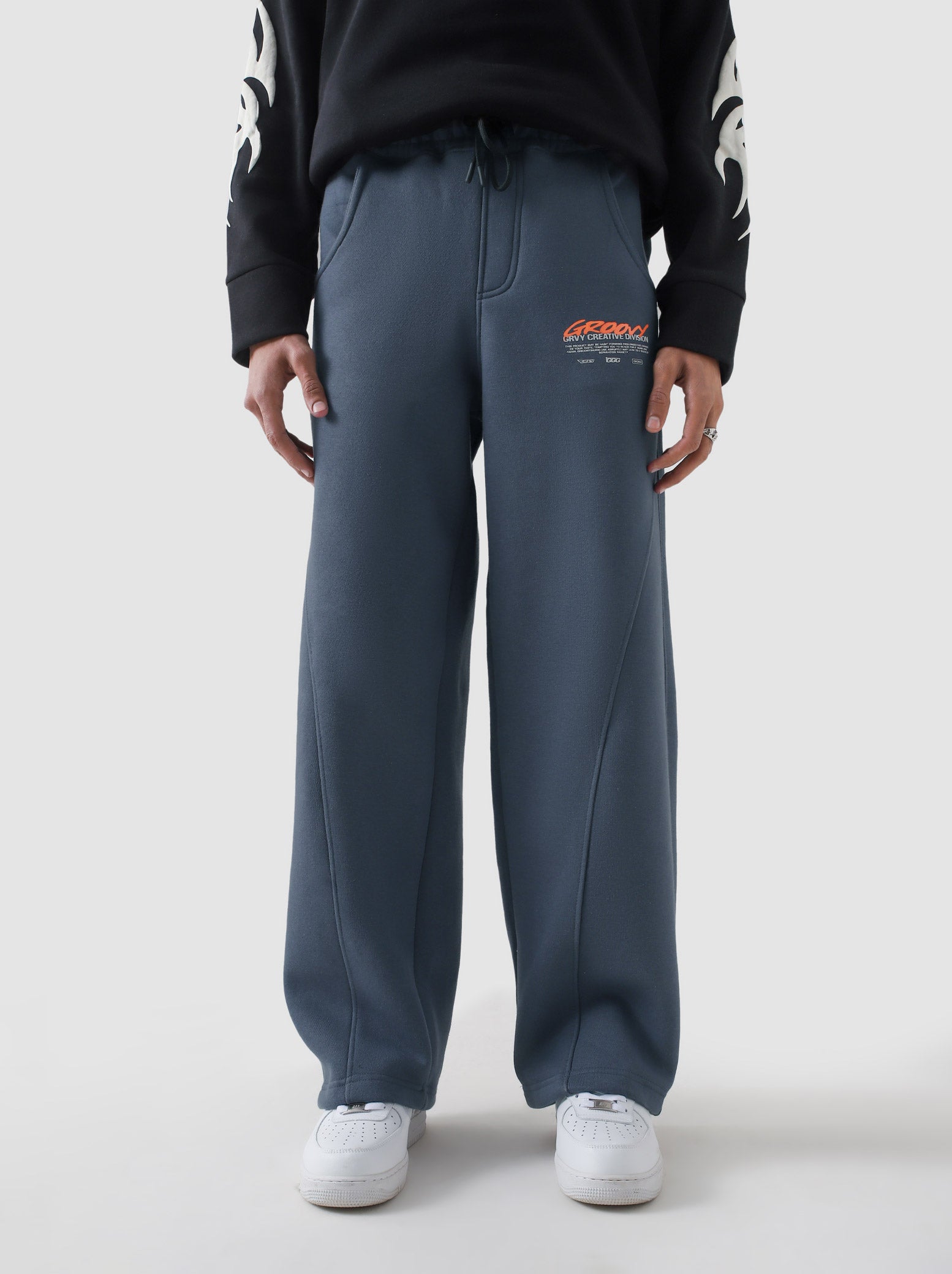 Unity VI slate blue winter trouser couple lifestyle shot streetwear Pakistan – GROOVY