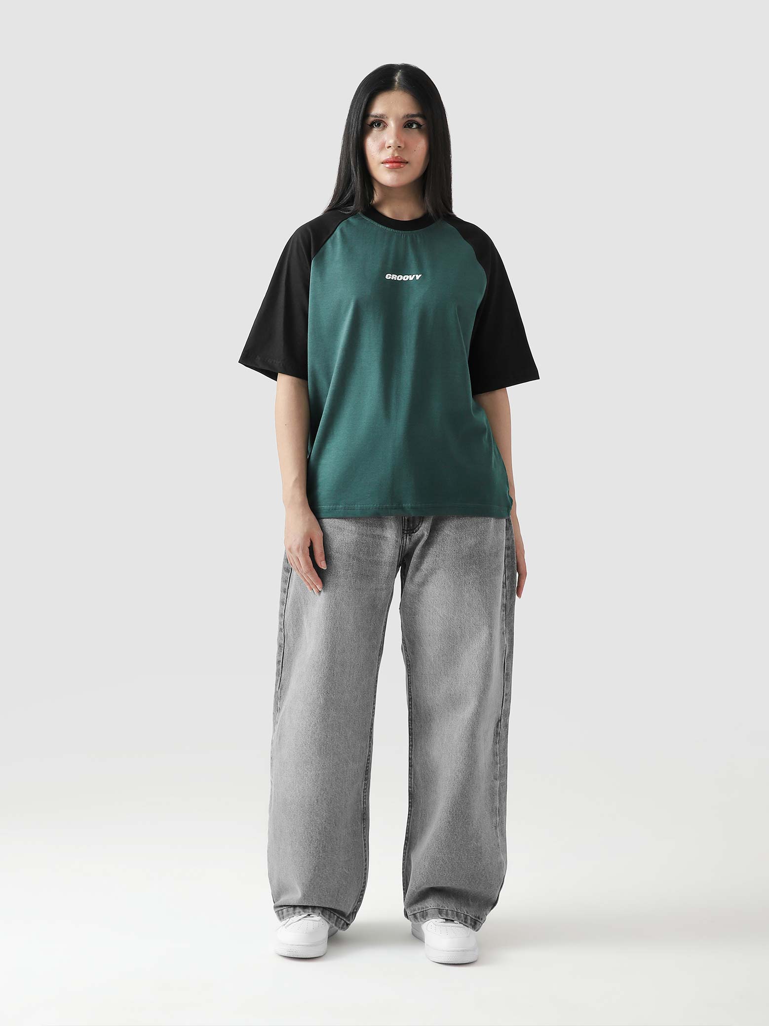 CORE tees racing green raglan female model front view contrast sleeve Pakistan – GROOVY