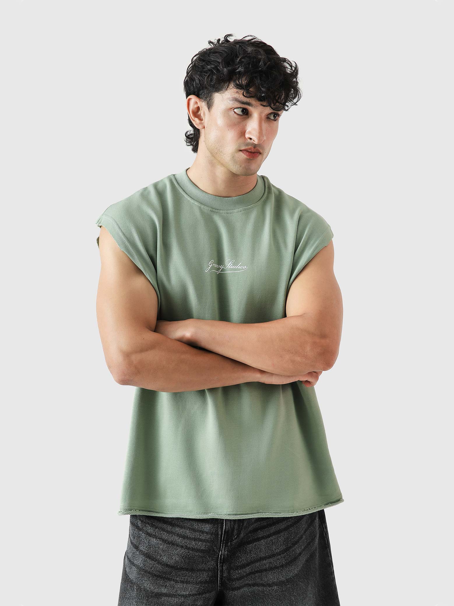 WORLDWIDE mint green sando couple lifestyle shot sleeveless streetwear Pakistan – GROOVY