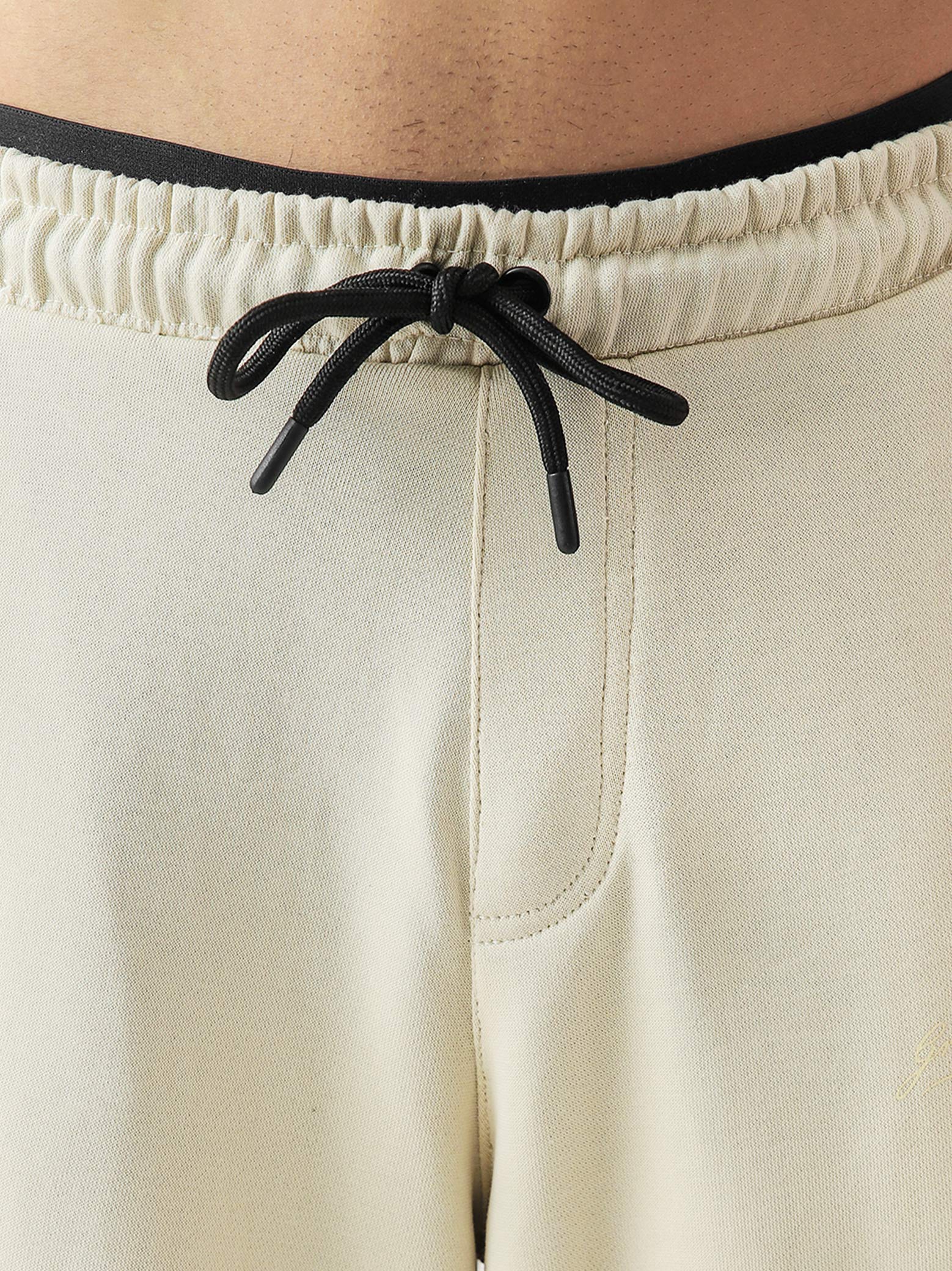 Cream baggy trousers female model lifestyle shot streetwear Pakistan – GROOVY