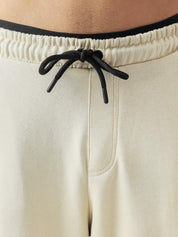 Cream baggy trousers female model lifestyle shot streetwear Pakistan – GROOVY