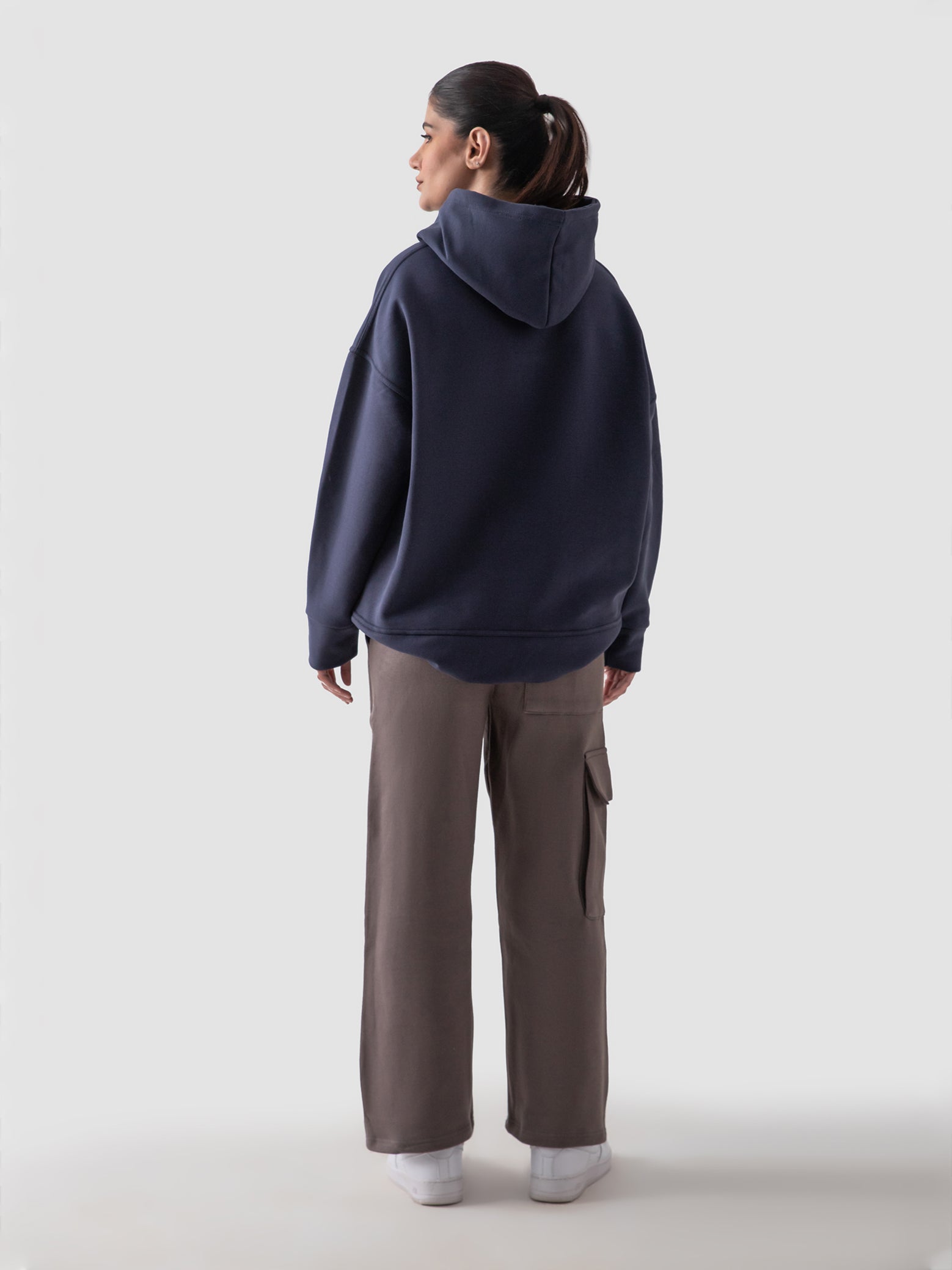 Navy blue oversized hoodie male model half body lifestyle shot Pakistan – GROOVY