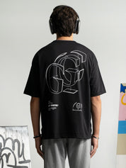 Initial Assembly tee couple lifestyle shot black graphic streetwear Pakistan – GROOVY