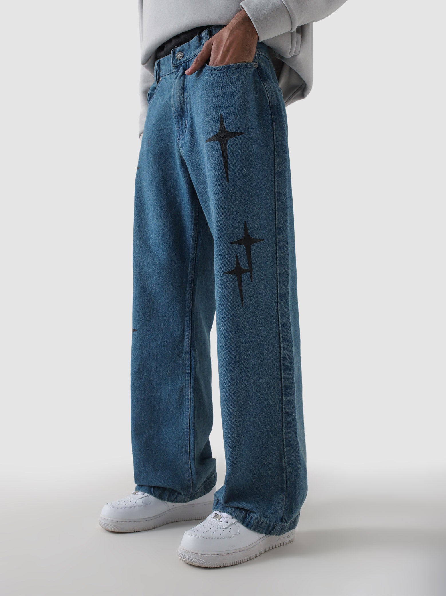 Cross star denim blue baggy jeans flat lay product detail Pakistan – GROOVY
