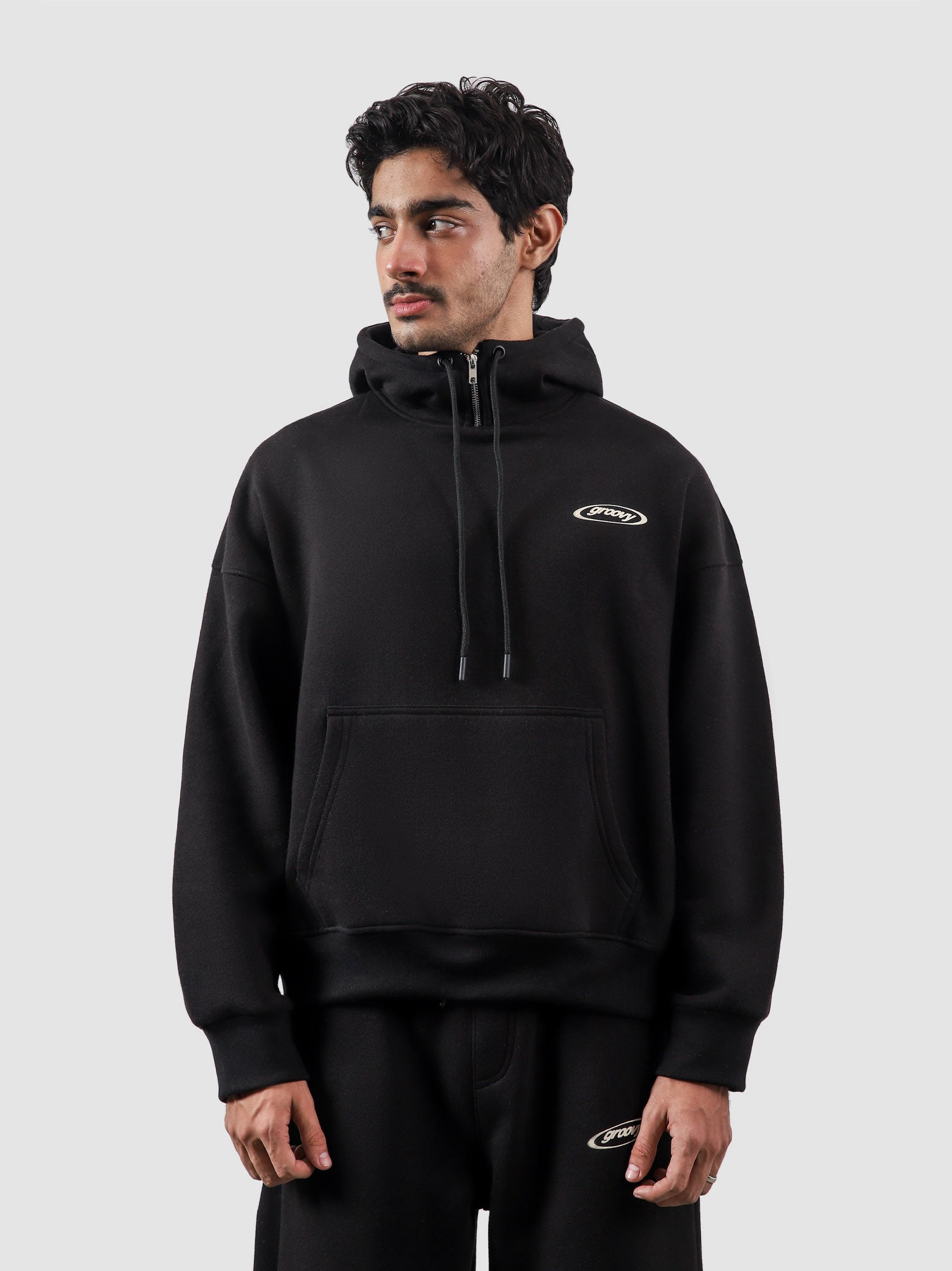 Utility Top black male model half body lifestyle shot Pakistan – GROOVY