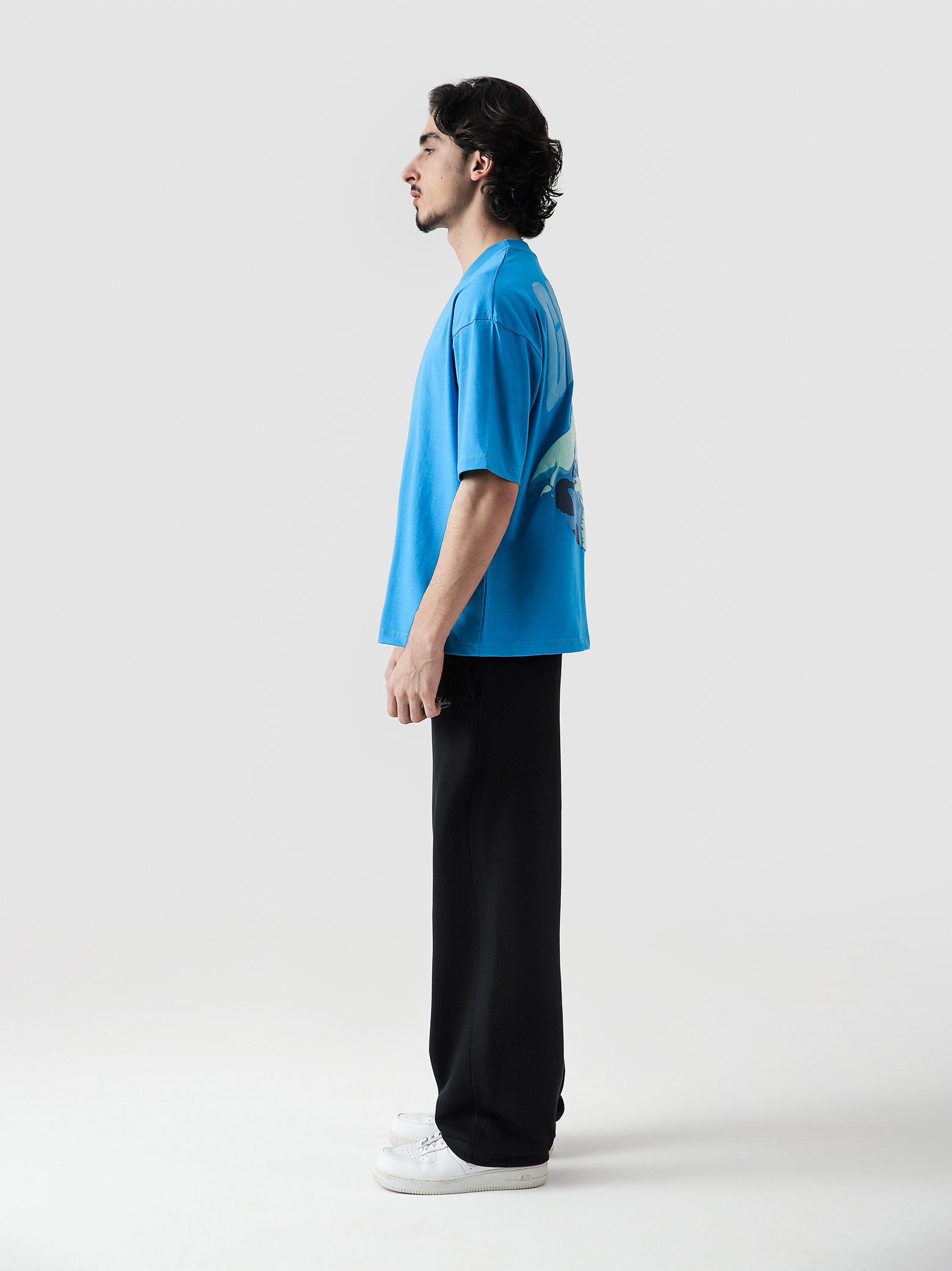 GRVY Shark electric blue tee male model outdoor lifestyle Pakistan – GROOVY