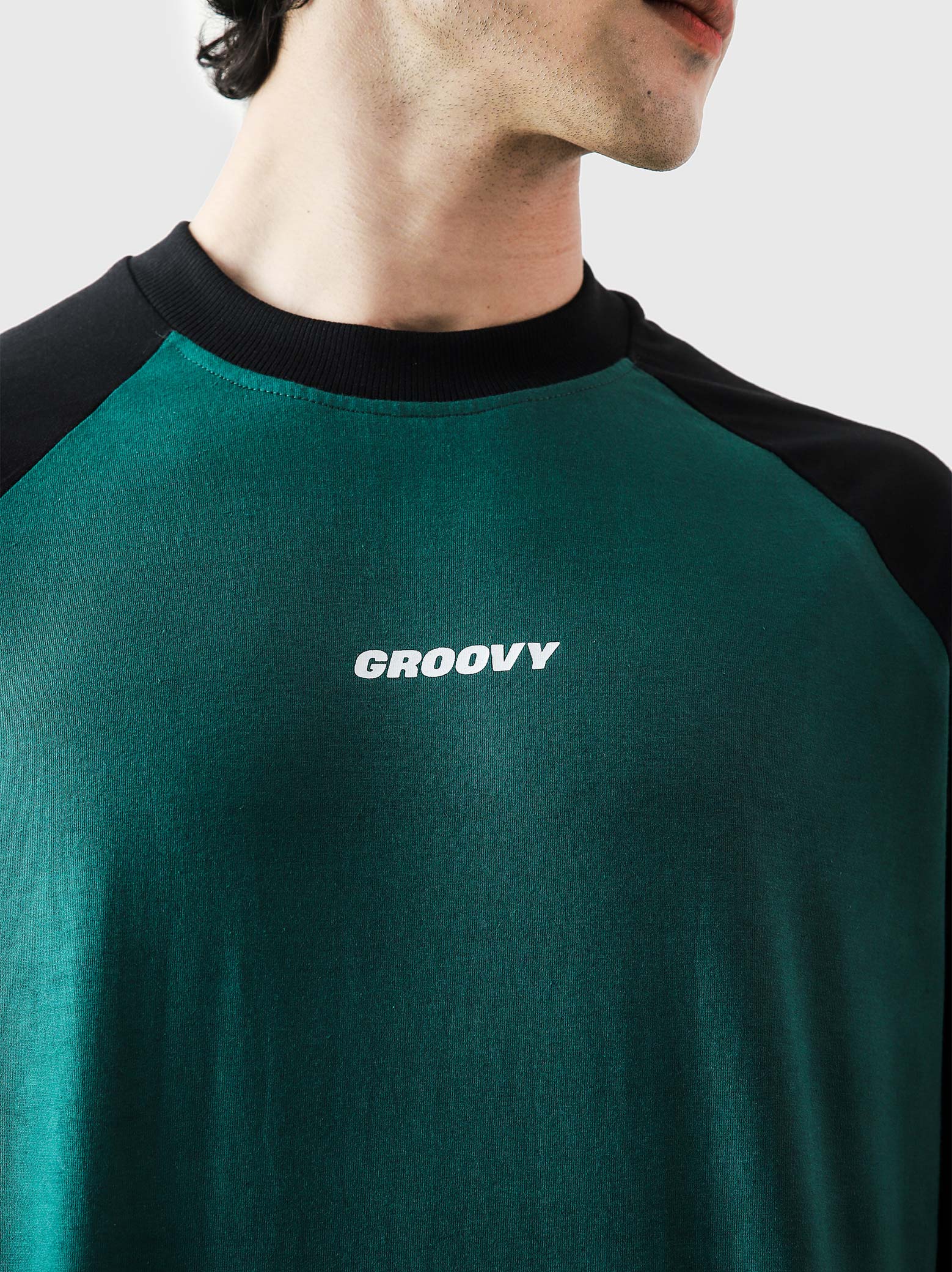 CORE tees racing green raglan female model back view oversized Pakistan – GROOVY
