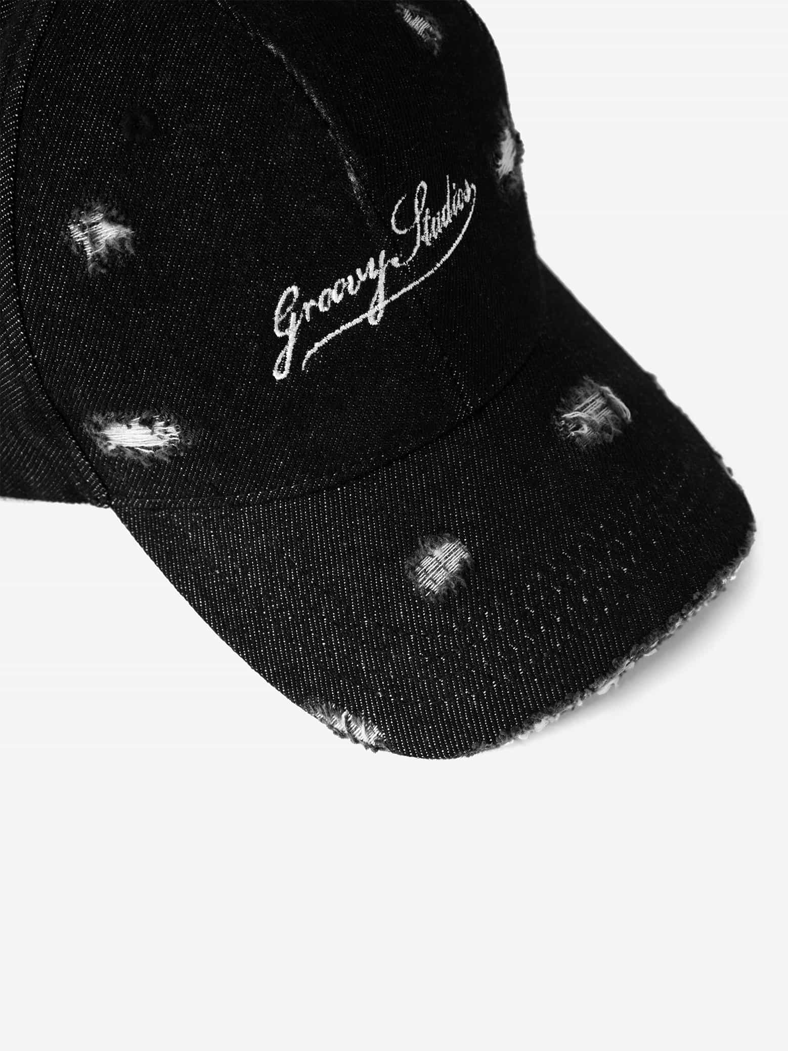 GROOVY Distressed Denim cap, frayed detail on washed black denim