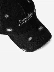 GROOVY Distressed Denim cap, frayed detail on washed black denim