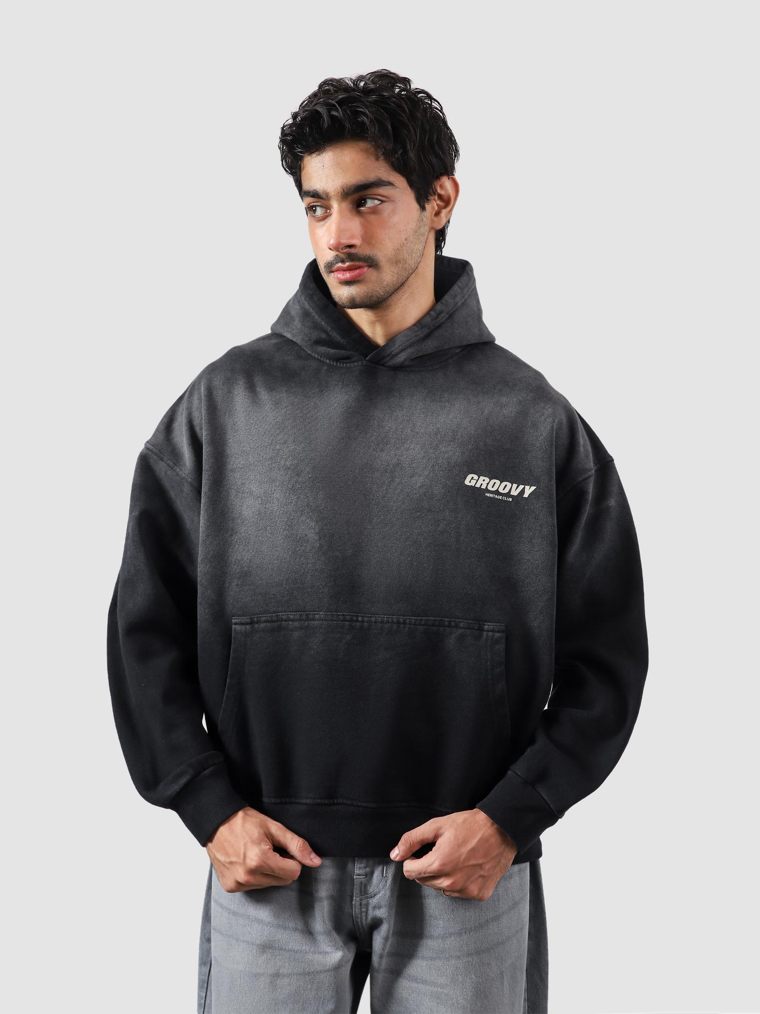 Fade washed hoodie detail closeup kangaroo pocket fade wash texture Pakistan – GROOVY