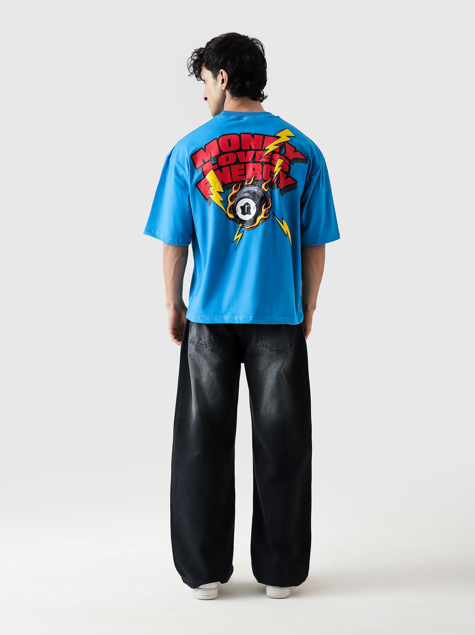 MONEY LOVES ENERGY tee male model outdoor lifestyle shot Pakistan – GROOVY