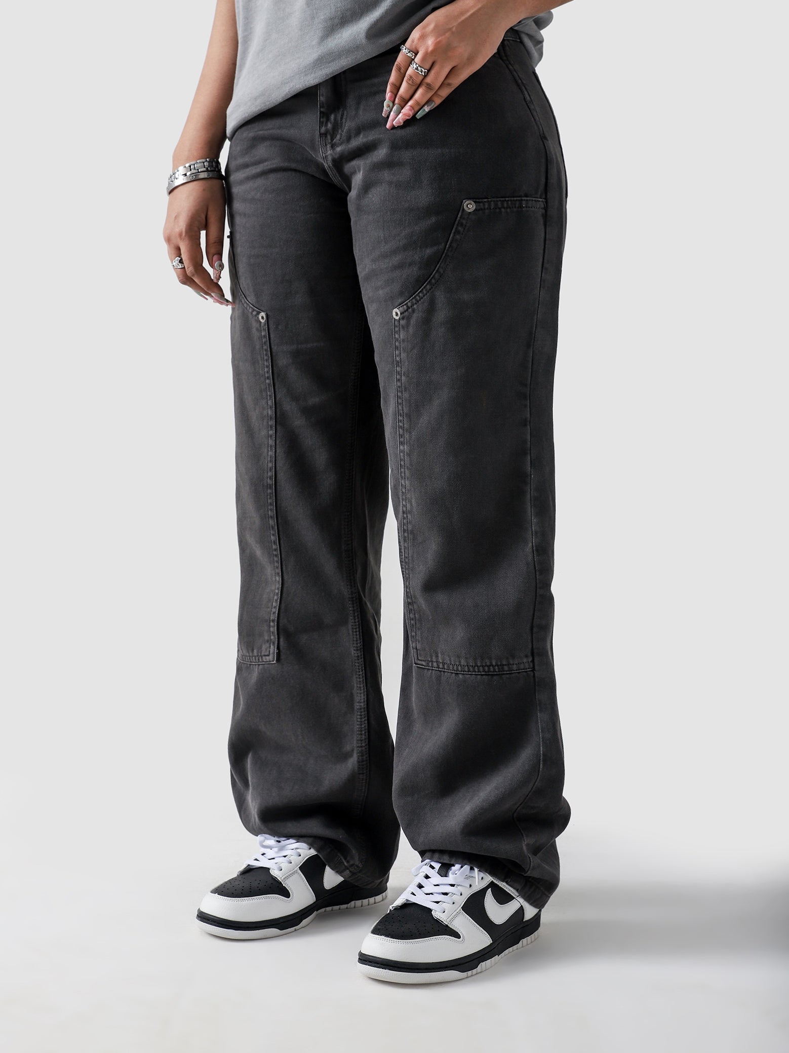 Dark grey carpenter denim female model front view baggy fit Pakistan – GROOVY