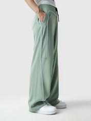 Piping trouser sage green male model outdoor lifestyle shot Pakistan – GROOVY