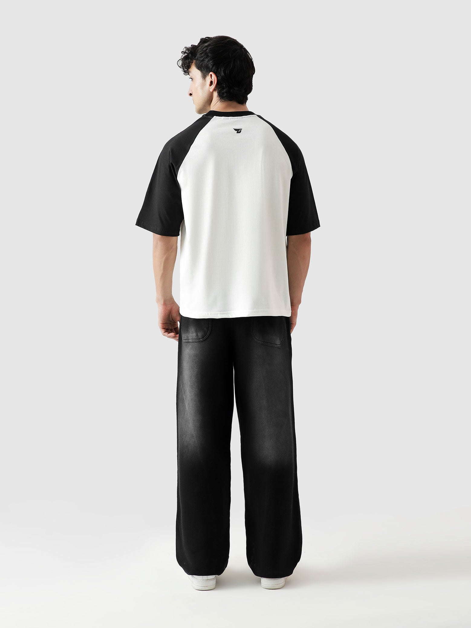 CORE tees black raglan couple lifestyle shot streetwear Pakistan – GROOVY