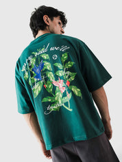 Green Hummingbird oversized tee male model outdoor lifestyle shot Pakistan – GROOVY