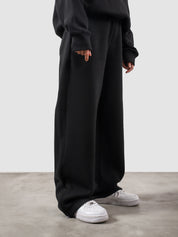 Utility Sweats black female model half body lifestyle shot Pakistan – GROOVY