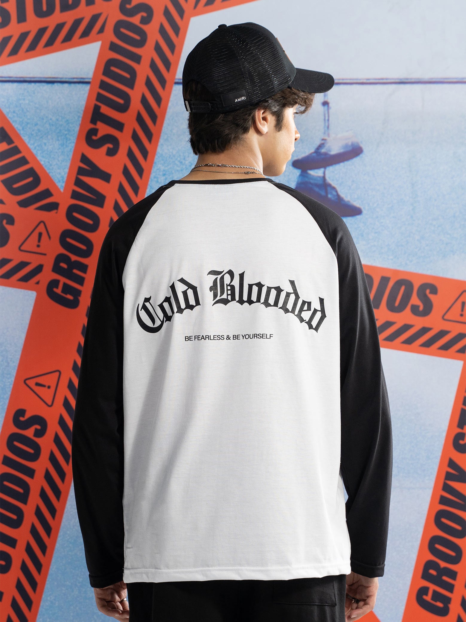 Cold Blooded raglan tee male model outdoor lifestyle shot streetwear Pakistan – GROOVY