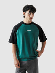 CORE tees racing green raglan couple lifestyle shot streetwear Pakistan – GROOVY