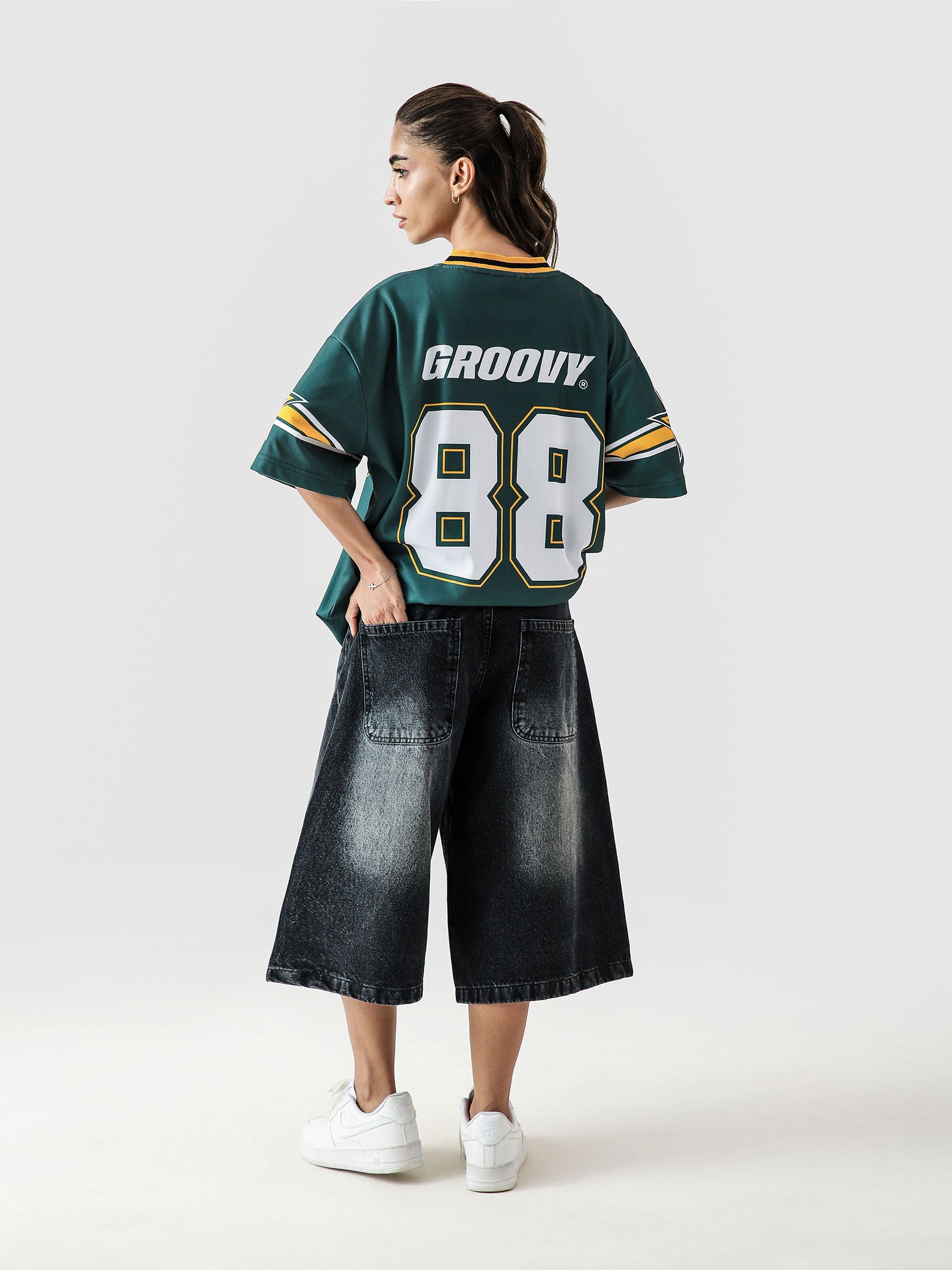88 Athletics basketball jersey female model front view green gold Pakistan – GROOVY