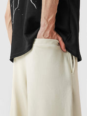 Cream baggy trousers detail shot waistband drawstring streetwear Pakistan – GROOVY