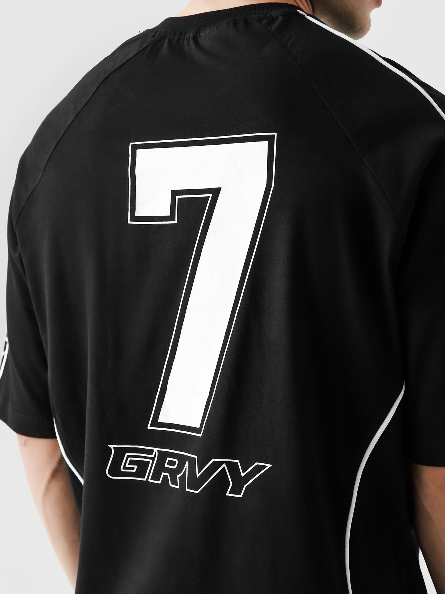 HARSH and CRUEL #7 black jersey closeup piping detail front graphic Pakistan – GROOVY