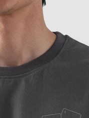 Close-up of ribbed neckline on stone grey oversized t-shirt from Groovy Pakistan – premium stitching detail and relaxed collar design