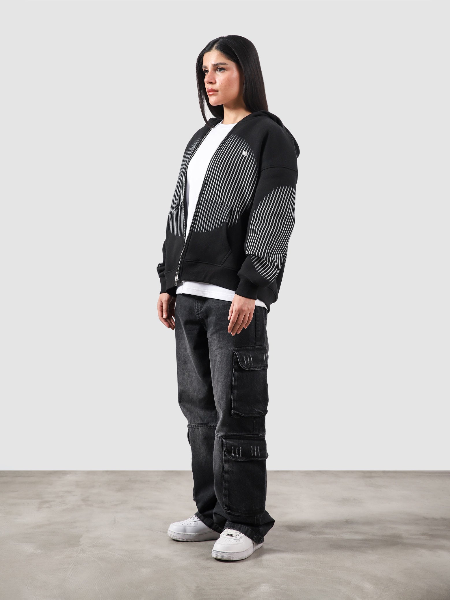 The Illusion Zipper hoodie male model seated half body lifestyle Pakistan – GROOVY