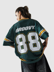 88 Athletics jersey female model back view racing green graphic Pakistan – GROOVY