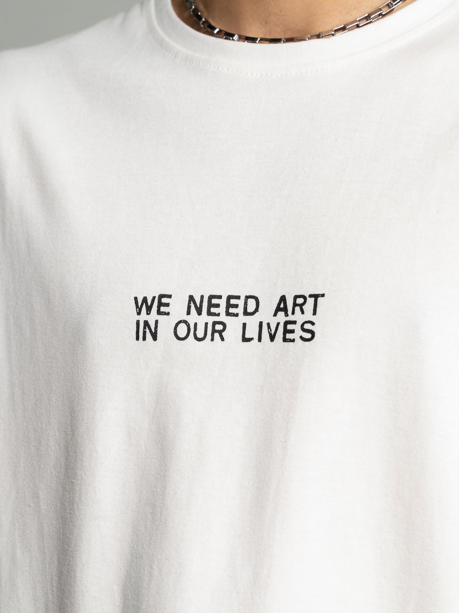 Pearl White Graphic Tee Product Detail – We Need Art In Our Lives – GROOVY Pakistan