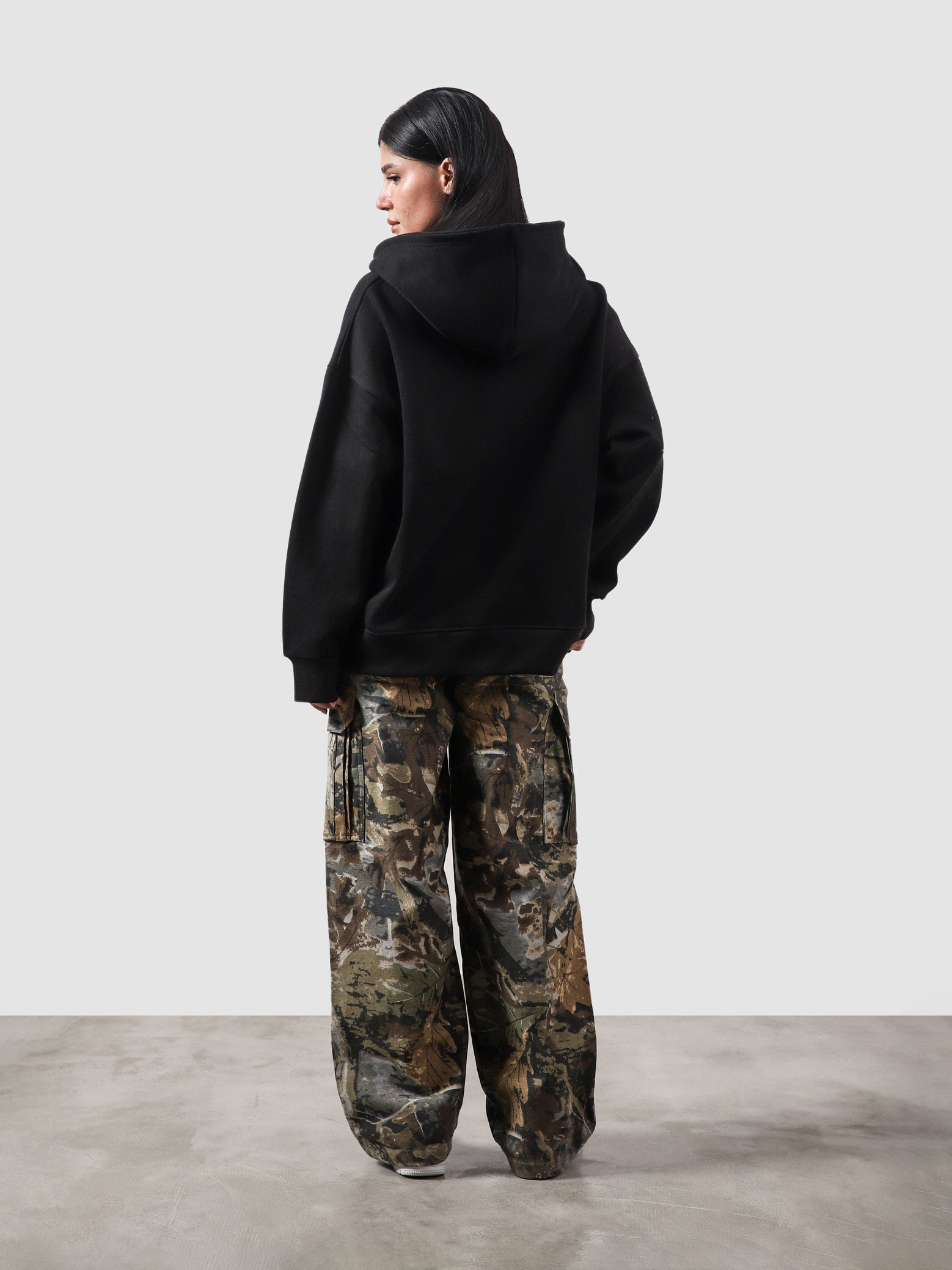 Black essential zipper hoodie detail closeup zip front fabric Pakistan – GROOVY