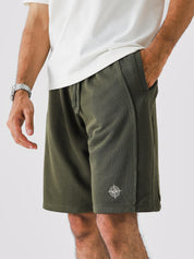 Military Green Aim Shorts by GROOVY, soft lightweight men's gym and everyday shorts in Pakistan