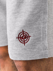 Arctyc White Aim Shorts on model, relaxed-fit men's gym and casual shorts by GROOVY Pakistan