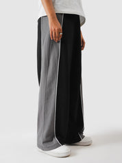 Cotton terry texture on black colour blocked sweatpants - GROOVY Pakistan