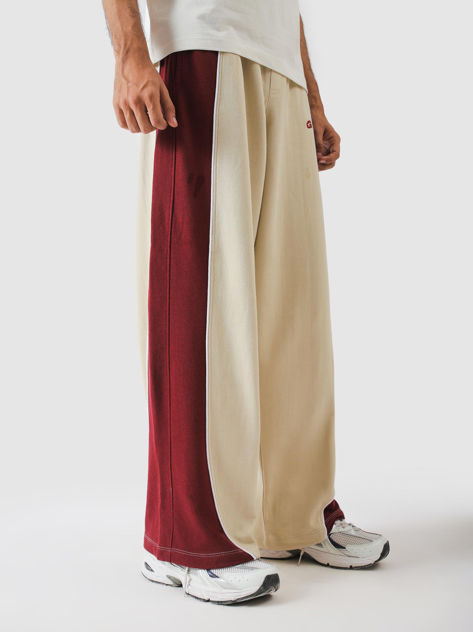 Red wine outer panel and white piping detail - GROOVY Pakistan
