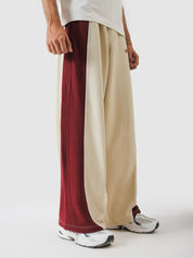 Red wine outer panel and white piping detail - GROOVY Pakistan