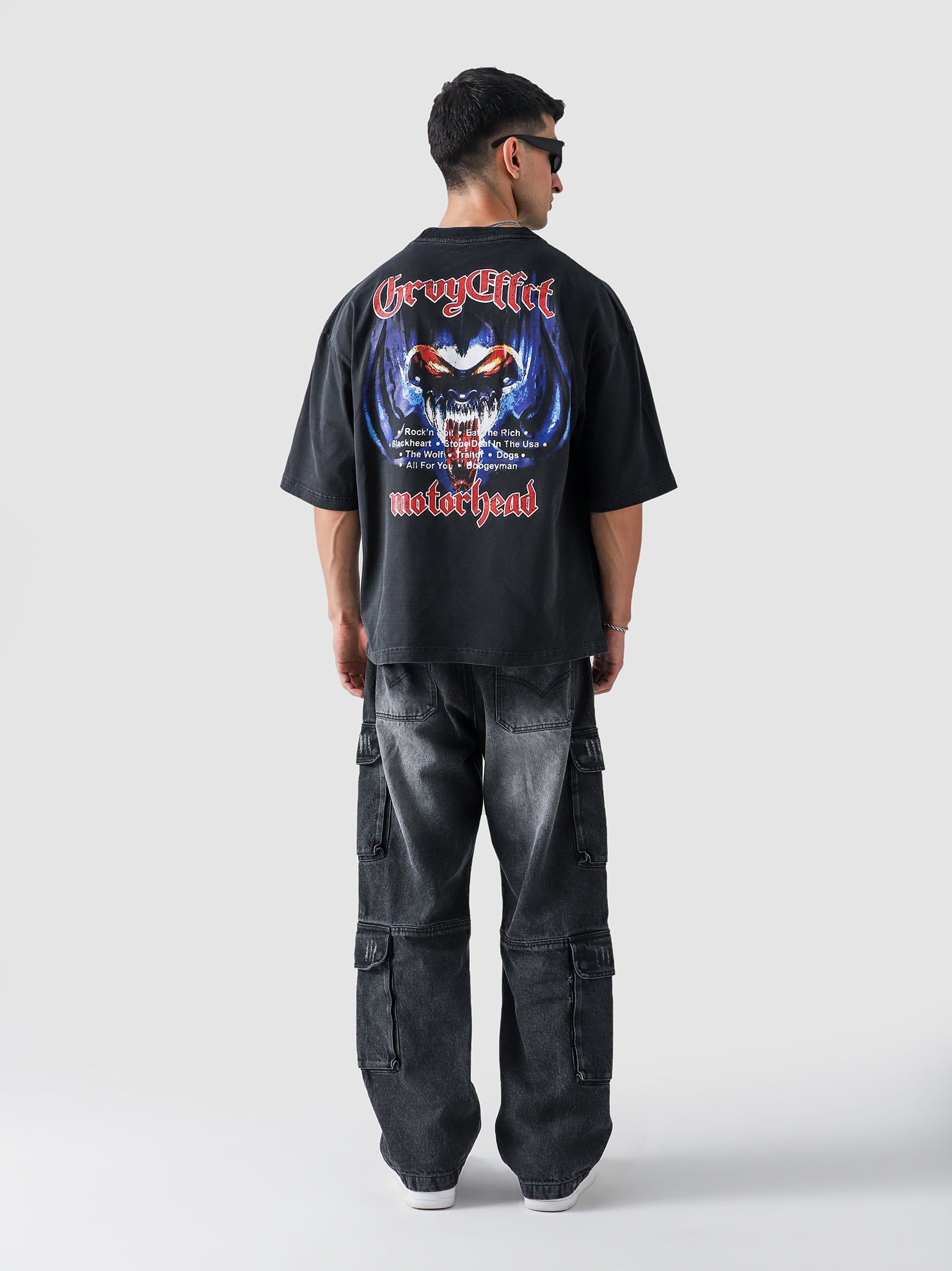 Black Washed Motorhead Tee Male Model Side View – GROOVY Pakistan