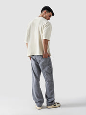 Cream Washed Blank Tee Female Model Back View – GROOVY Pakistan