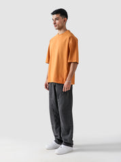 Rust Orange Washed Blank Tee Male Model Outdoor Lifestyle – GROOVY Pakistan