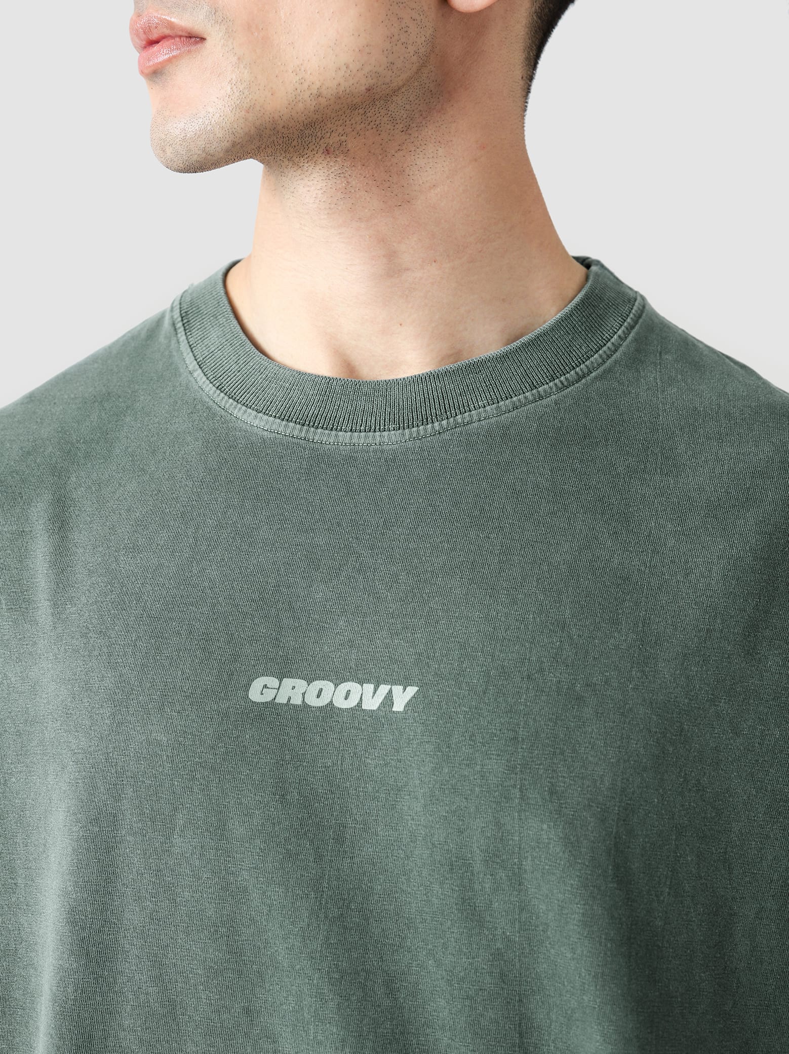 Emerald Green Washed Blank Tee Female Model Front View – GROOVY Pakistan