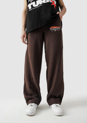 Mocha brown Unity VI pants female model back view relaxed fit streetwear Pakistan – GROOVY